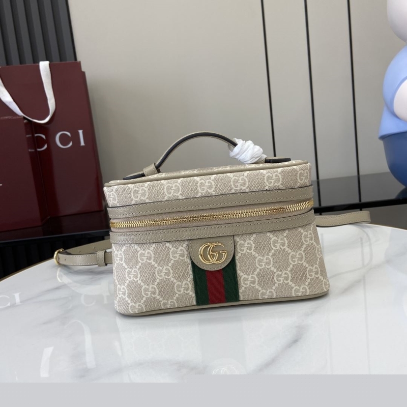 G*u*i cosmetic bags